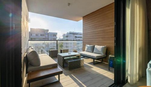 Three-Bedroom Apartment with Harbor View