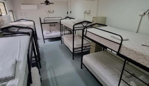 Single bed in a Dormitory Room with AC