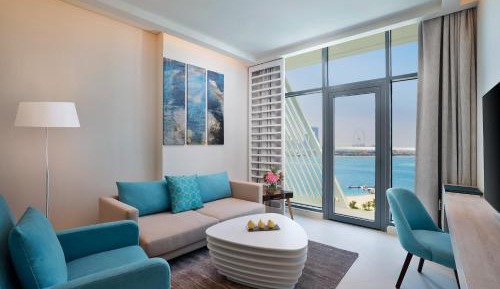 Superior One Bedroom Sea View Apartment with Balcony, Kitchen, Beach & Rooftop Infinity Pool Access