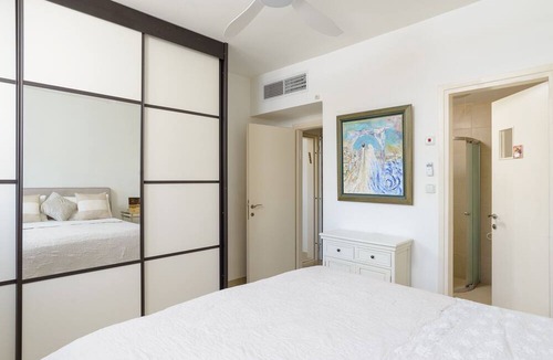 Tel Aviv Promenade Apartment | MAMAD Airy & Bright with Balcony & Parking steps from Beach by FeelHome