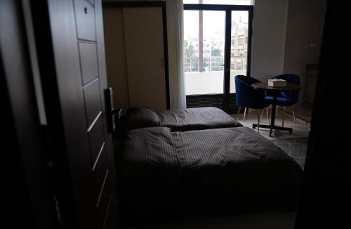 Jabal Al-Hussein Apartment | المتطورة للشقق الفندقية