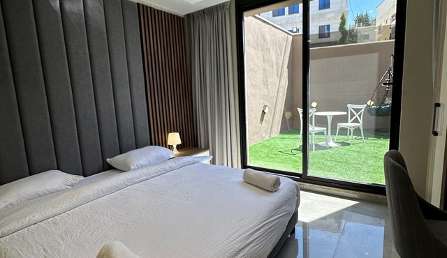 Charming Amman Apartment with Garden and Balcony