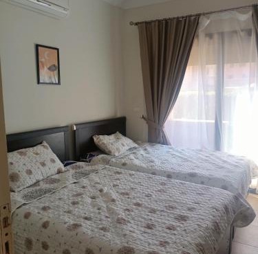 'Ground Chalet with a Lagoon and Pool View in Blue Pay Assia 'Families Only in Ain Sokhna