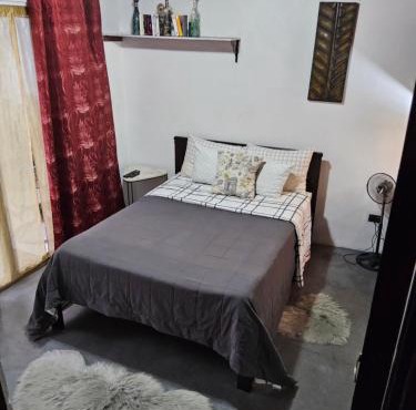 Apartamento vista al jardín, cocina externa